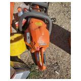Two Husqvarna Gas powered Chain saws and Misc Accessories one works as it should the other is for Parts or Repair
