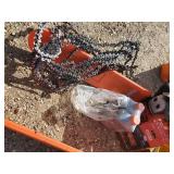 Two Husqvarna Gas powered Chain saws and Misc Accessories one works as it should the other is for Parts or Repair