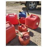 Lot of Various Gas Cans Some have Gas in them