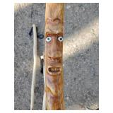3 Handmade Handcarved Walking Sticks one with Carved Face in it
