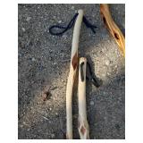 3 Handmade Handcarved Walking Sticks one with Carved Face in it