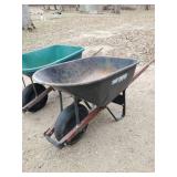 2 Wheel Barrows   One is Metal and in Good Condition other is Plastic and needs repair or for light use