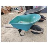 2 Wheel Barrows   One is Metal and in Good Condition other is Plastic and needs repair or for light use