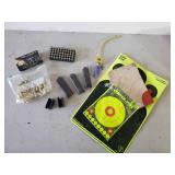 45 Auto Ammo, Targets, and Gun Clips with Some Ammo in them, and Gun Lock