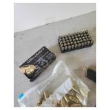 45 Auto Ammo, Targets, and Gun Clips with Some Ammo in them, and Gun Lock