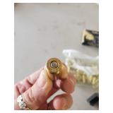 45 Auto Ammo, Targets, and Gun Clips with Some Ammo in them, and Gun Lock