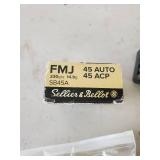 45 Auto Ammo, Targets, and Gun Clips with Some Ammo in them, and Gun Lock