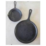 Size 8 and Size 4 Cast Iron Pans one marked Lodge on the Bottom,  both in good condition