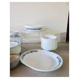 Lot of Corningware Dishes, Plates Bowls Saucers With a variety of sizes and more