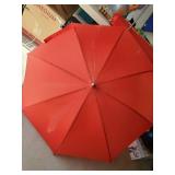 2 umbrellas, Red one is hand held, Old Style is either hand heald or has in the ground Extension, along with Hand weights and more