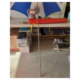 2 umbrellas, Red one is hand held, Old Style is either hand heald or has in the ground Extension, along with Hand weights and more