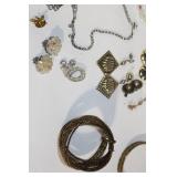 Assorted Costume Jewelry Collection including Necklaces, Bracelets, and Earrings