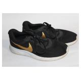 Pair of Nike Black and Gold Men