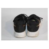 Pair of Nike Black and Gold Men