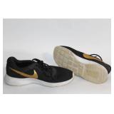 Pair of Nike Black and Gold Men