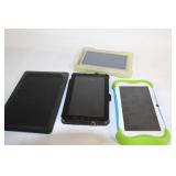 Lot of 4 Assorted Used Tablets with Protective Cases