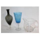 Set of 3 Art Glass Pieces: Black Vase, Blue Wine Glass, and Clear Pitcher