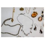 Assorted Jewelry Collection featuring Necklaces, Earrings, Bracelets, and Brooches