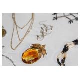 Assorted Jewelry Collection featuring Necklaces, Earrings, Bracelets, and Brooches