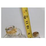 Collection of 3 Glass Bottles and Lidded Jar