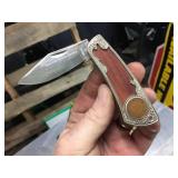 Nifty Pocket Knives in Cigar Box