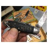 Nifty Pocket Knives in Cigar Box