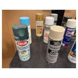 Sixteen Cans of Spray Paint