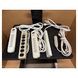 Three Six-Outlet Power Strips and One Extension Cord
