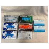 Six Boxes of Gloves and Two Boxes of Face Masks