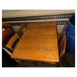 Vintage Wooden Dining Table with Four Matching Chairs