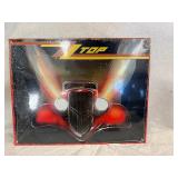 Kiss and ZZ Top Tin Signs 16" x 12.5". New in Wrap.