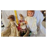 Assorted Dolls and Doll Stand