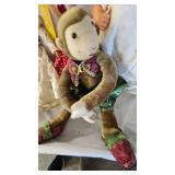 Assorted Dolls and Doll Stand