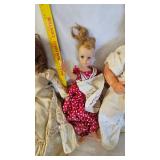 Assorted Dolls and Doll Stand