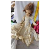 Assorted Dolls and Doll Stand