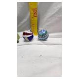 Large Shooter Marbles along with Frog Figures and Poodle Wind Up Toy