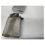 2 Vintage Slim Zippo Lighters (1) 1960 J.S. Stearns Contractor Advertising (1) Scrimshaw Whale 1990