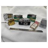 7 Assorted Vintage Lighters (2) Salem, (1) Marlboro Side Spin, (1) Mini with Chain (1) Camera Looking (1) Vernco (1) Smaller No Name