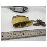 7 Assorted Vintage Lighters (2) Salem, (1) Marlboro Side Spin, (1) Mini with Chain (1) Camera Looking (1) Vernco (1) Smaller No Name