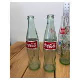 9 Vintage Assorted Coke Bottles (3) Celebrate the Century Mount Rushmore, (1) Crazy Horse