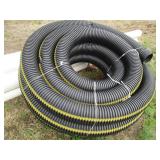 Large roll of 6in plastic drain pip...