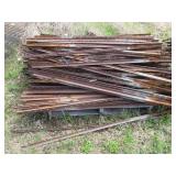Large pile of metal sign/fence post...