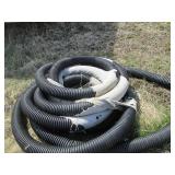 Large roll of 6in plastic drain pip...