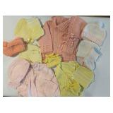 Collection of Hand-Knit Baby Clothing and Accessories