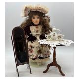 Vintage Porcelain Doll with Tea Set, Mirror, and Table