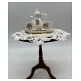 Vintage Porcelain Doll with Tea Set, Mirror, and Table