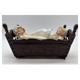 Vintage Wooden Baby Cradle with Two Porcelain Bye Lo Bisque Dolls and One Made in Japan Cloth Doll