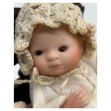 Vintage Wooden Baby Cradle with Two Porcelain Bye Lo Bisque Dolls and One Made in Japan Cloth Doll