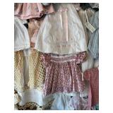 Collection of 17 Vintage Baby Doll Clothes, Various Styles and Fabrics