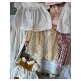 Collection of 17 Vintage Baby Doll Clothes, Various Styles and Fabrics